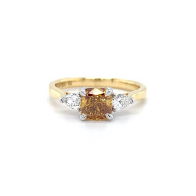 Pre-Owned 1.04ct Cushion cut Coloured Diamond with Diamond sides Engagement ring set in 18ct Yellow gold