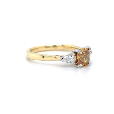 Pre-Owned 1.04ct Cushion cut Coloured Diamond with Diamond sides Engagement ring set in 18ct Yellow gold
