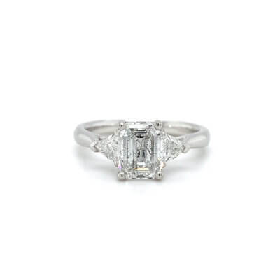 Pre-Owned 1.51ct Emerald cut Diamond with Diamond sides Engagement ring set in Platinum