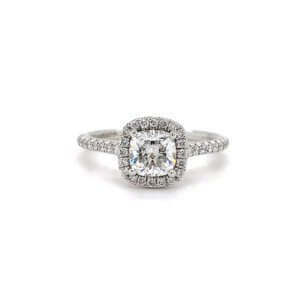 Pre-Owned 1.01ct Oval cut Diamond Engagement ring with Diamond set halo and shoulders made in 18ct White Gold